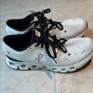 On Running White and Black Sneakers